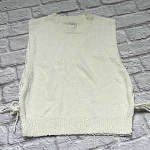 Cream women’s sweater tank with tie sides